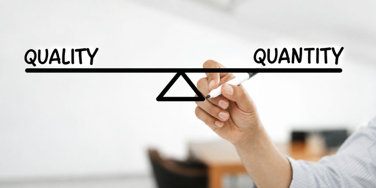 A person drawing a scale to measure quality & quantity