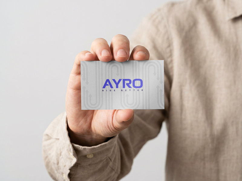 AYRO business card mockup featuring modern branding and logo design created by Draftss