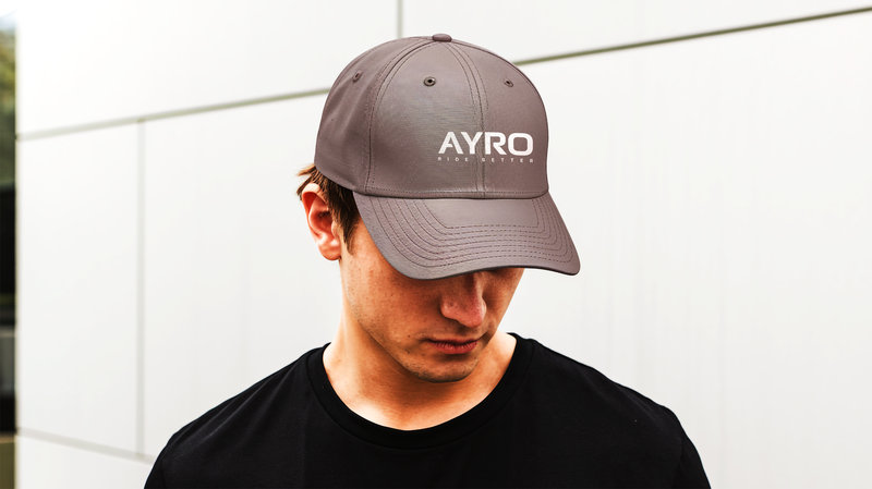 AYRO branded cap mockup with embroidered logo design created by Draftss
