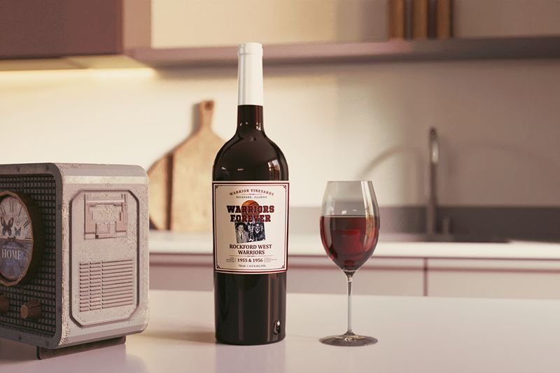 Wine bottle and glass displayed in a kitchen setting.