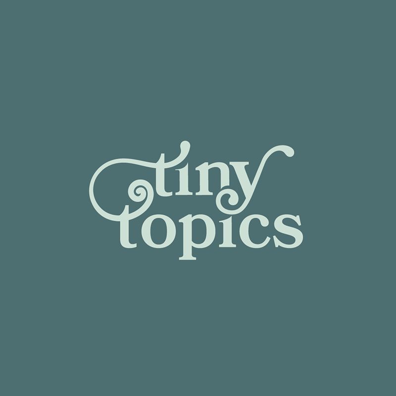 Tiny Topics logo in cream typography on a muted green background for July Design Highlights