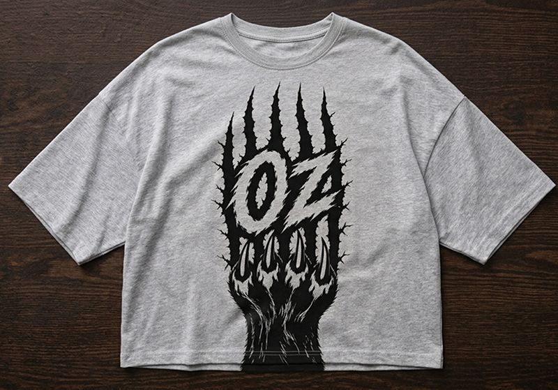 Camp Oz graphic printed on a gray T-shirt.